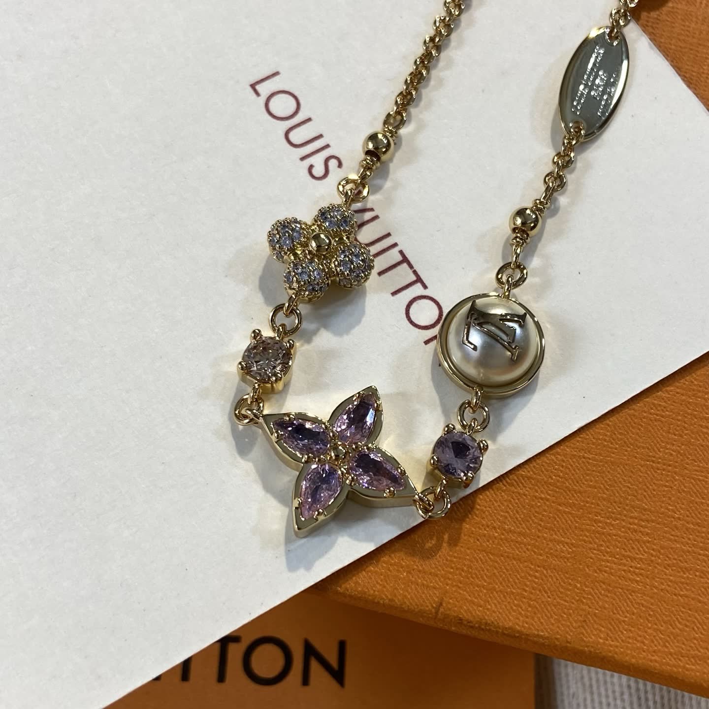 Louis Vuitton Gold Tone Bracelet with Purple Stones-LS0744